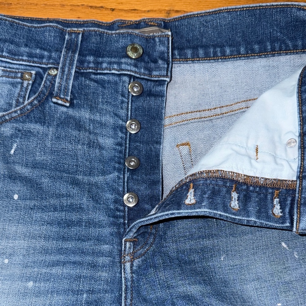Poin sur Denim Women's Distressed Blue Flare Jeans